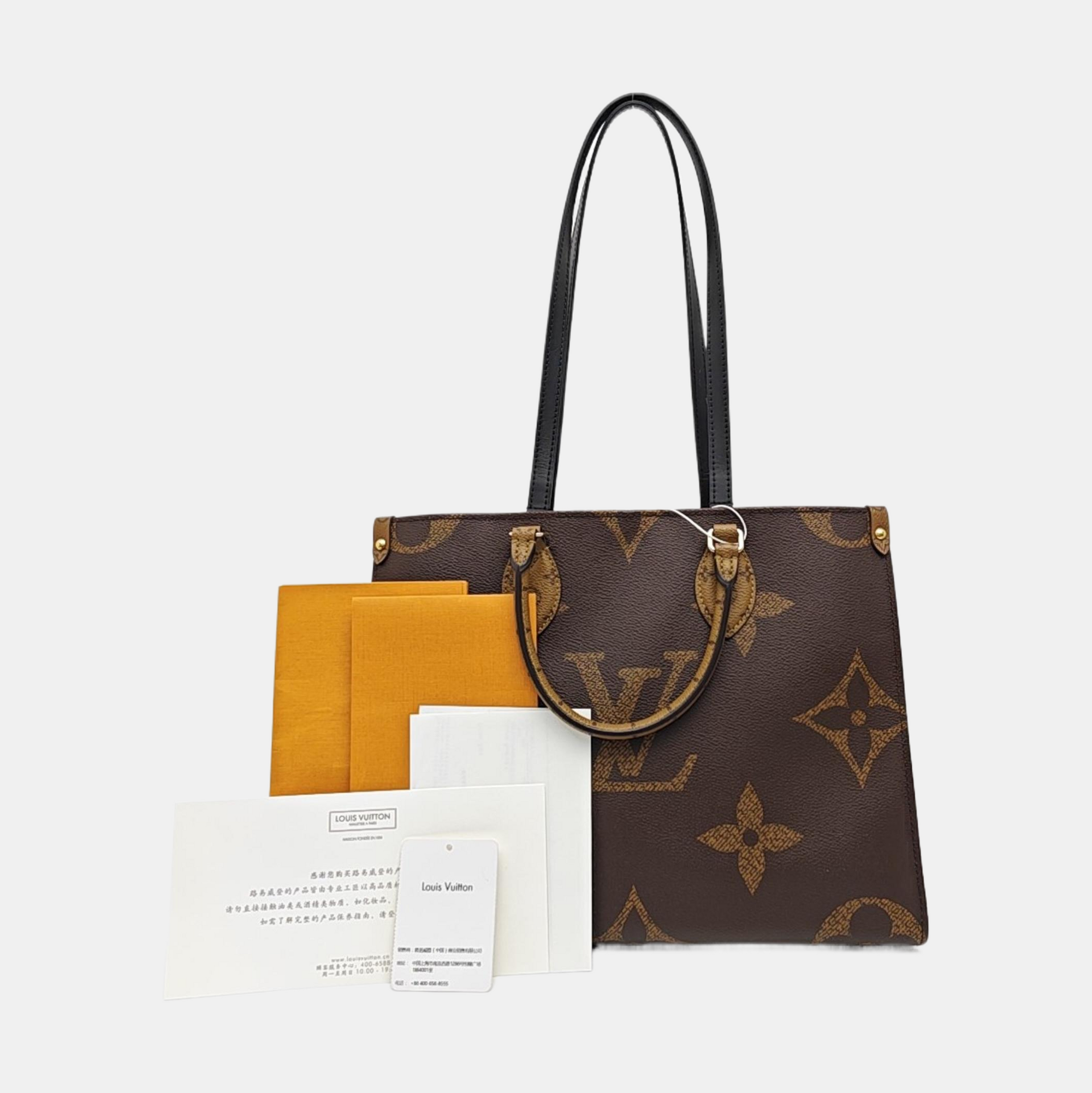 ONTHEGO MM Monogram Coated Canvas Brown