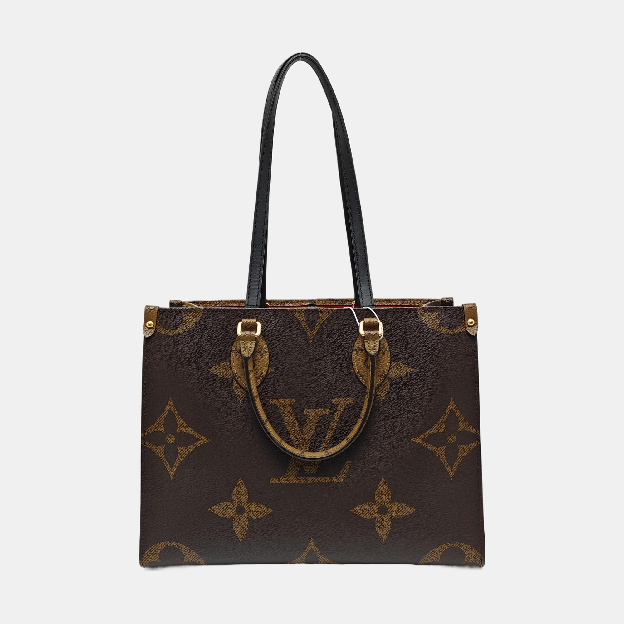 ONTHEGO MM Monogram Coated Canvas Brown
