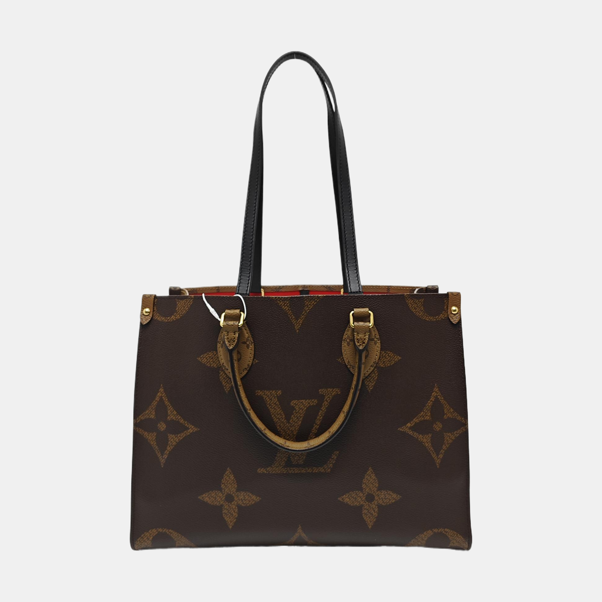ONTHEGO MM Monogram Coated Canvas Brown
