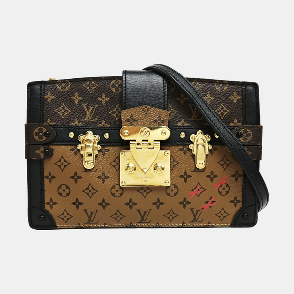 TRUNK Monogram Coated Canvas Brown
