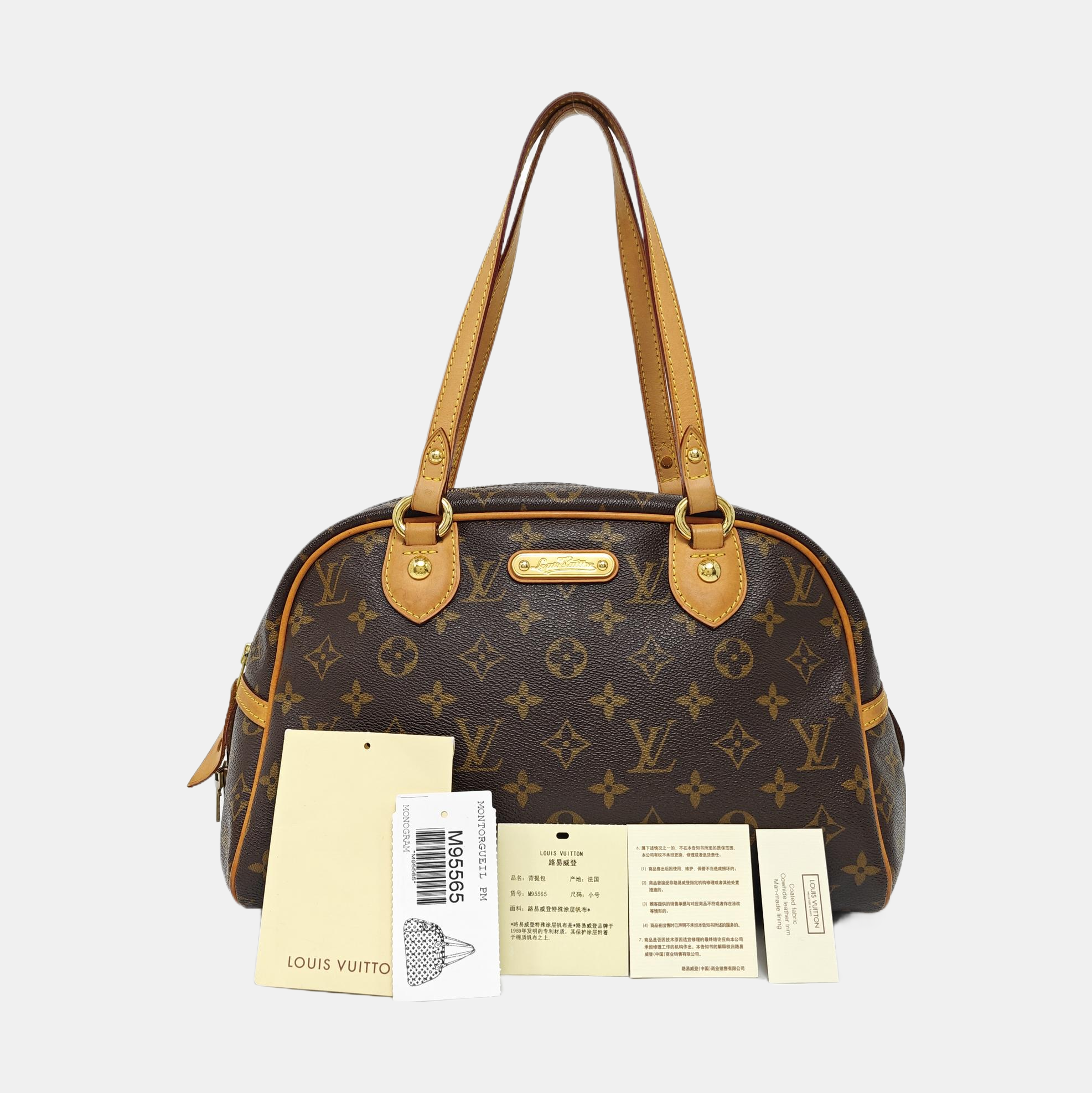 MONTORGUEI PM Monogram Coated Canvas Brown
