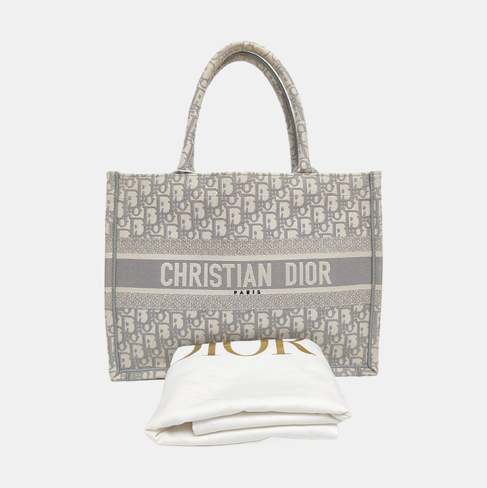Authenticated pre-owned  Book Tote Medium Oblique Canvas White - Tote Bag at Looply