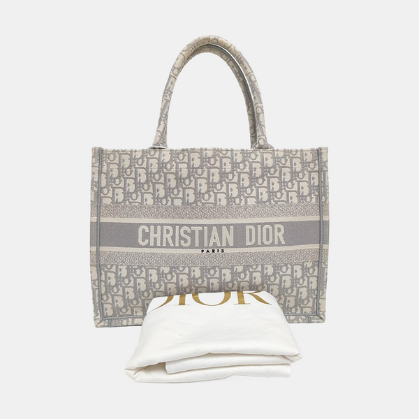 Authenticated pre-owned  Book Tote Medium Oblique Canvas White - Tote Bag at Looply