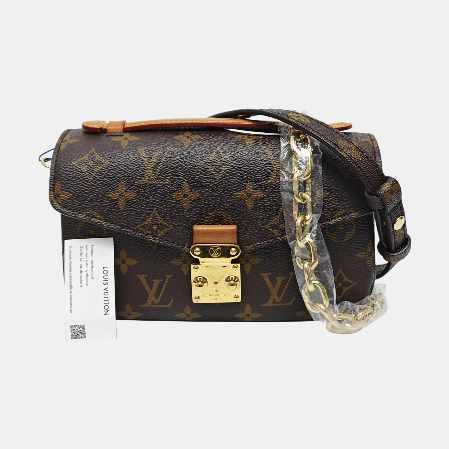 MÉTIS EAST WEST Monogram Coated Canvas Brown