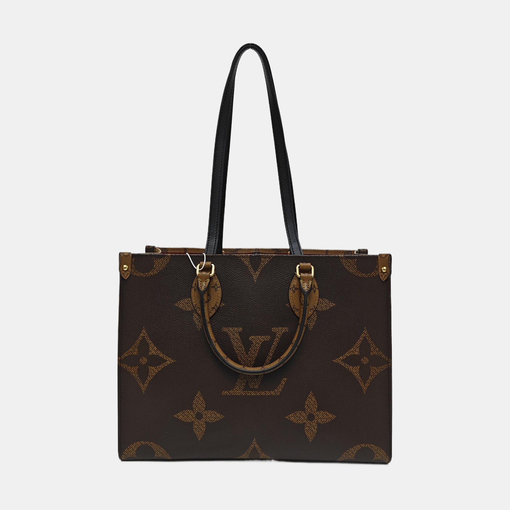 ONTHEGO MM Monogram Coated Canvas Brown