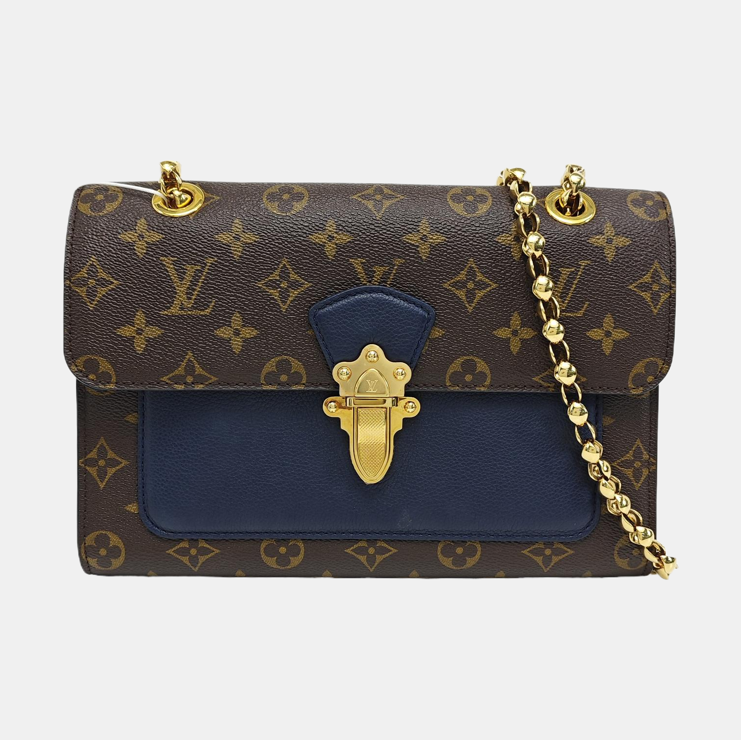 VICTOIRE Monogram Coated Canvas Brown