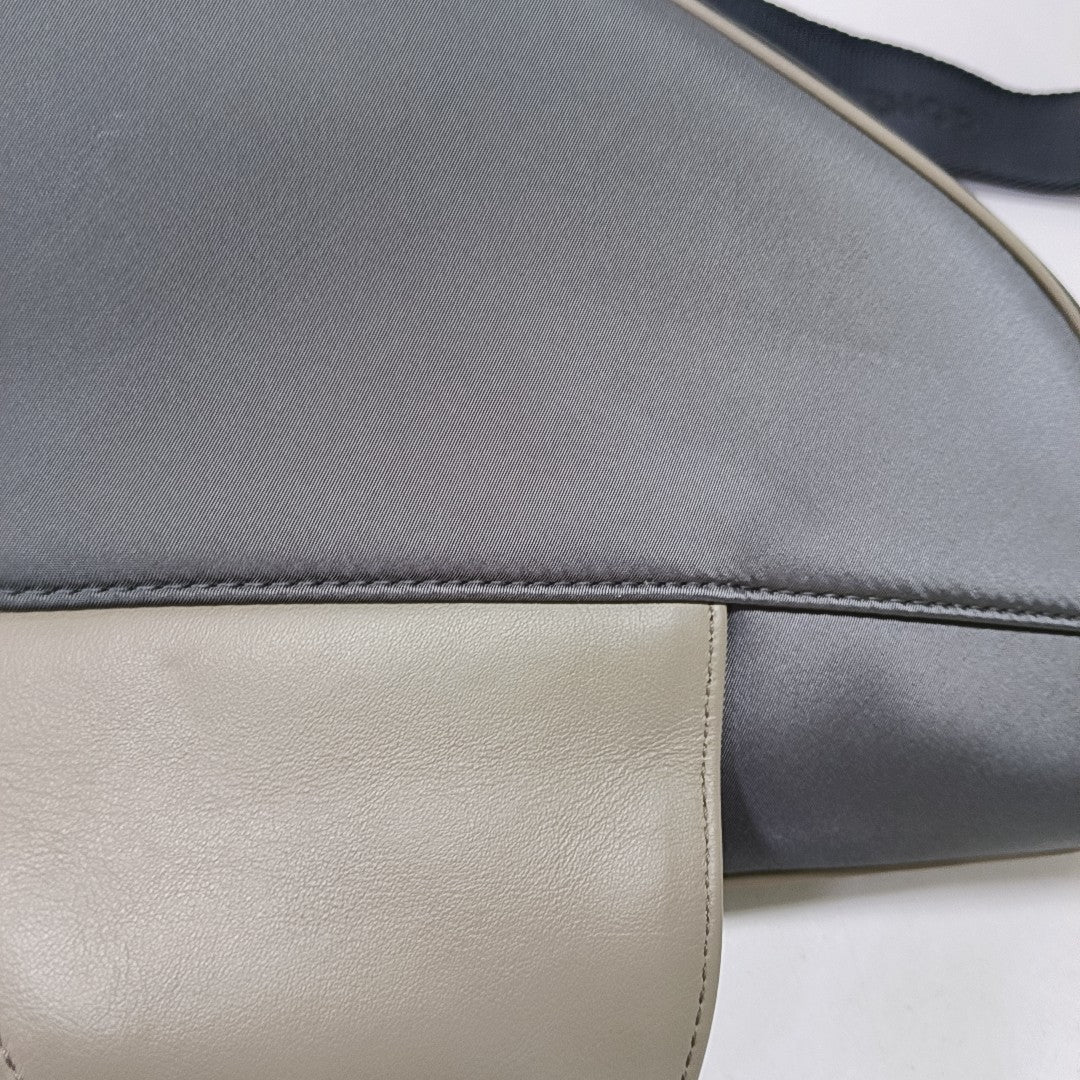 Authenticated pre-owned  Saddle Calfskin Gray - Crossbody Bag at Looply