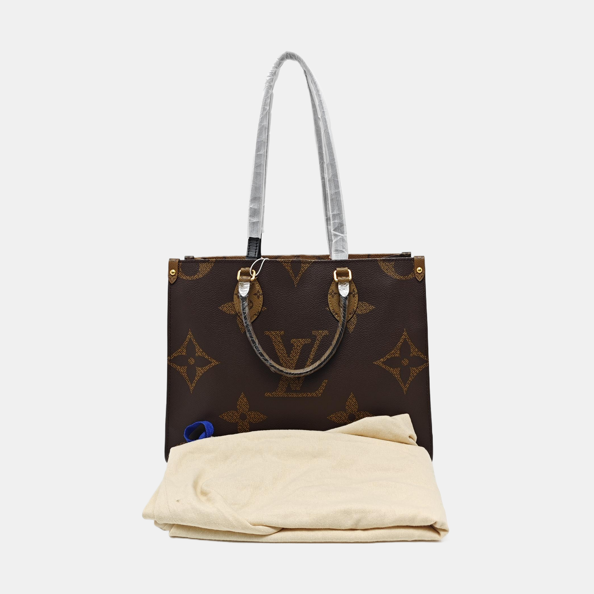 ONTHEGO MM Monogram Coated Canvas Brown
