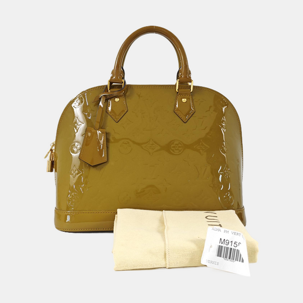 Authenticated pre-owned  ALMA PM Patent Leather Yellow - Top Handle Bag at Looply