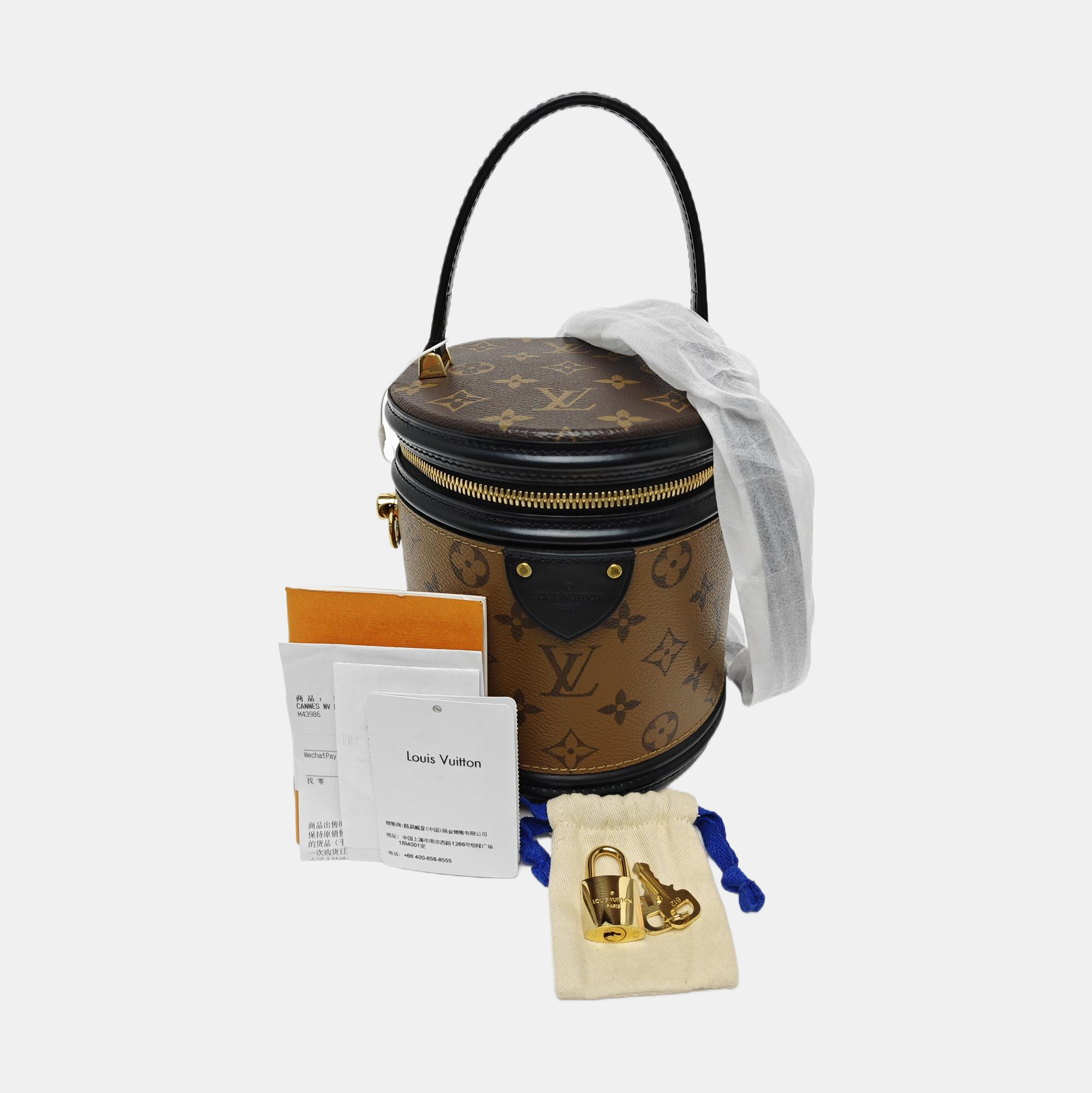 CANNES PM Monogram Coated Canvas Brown