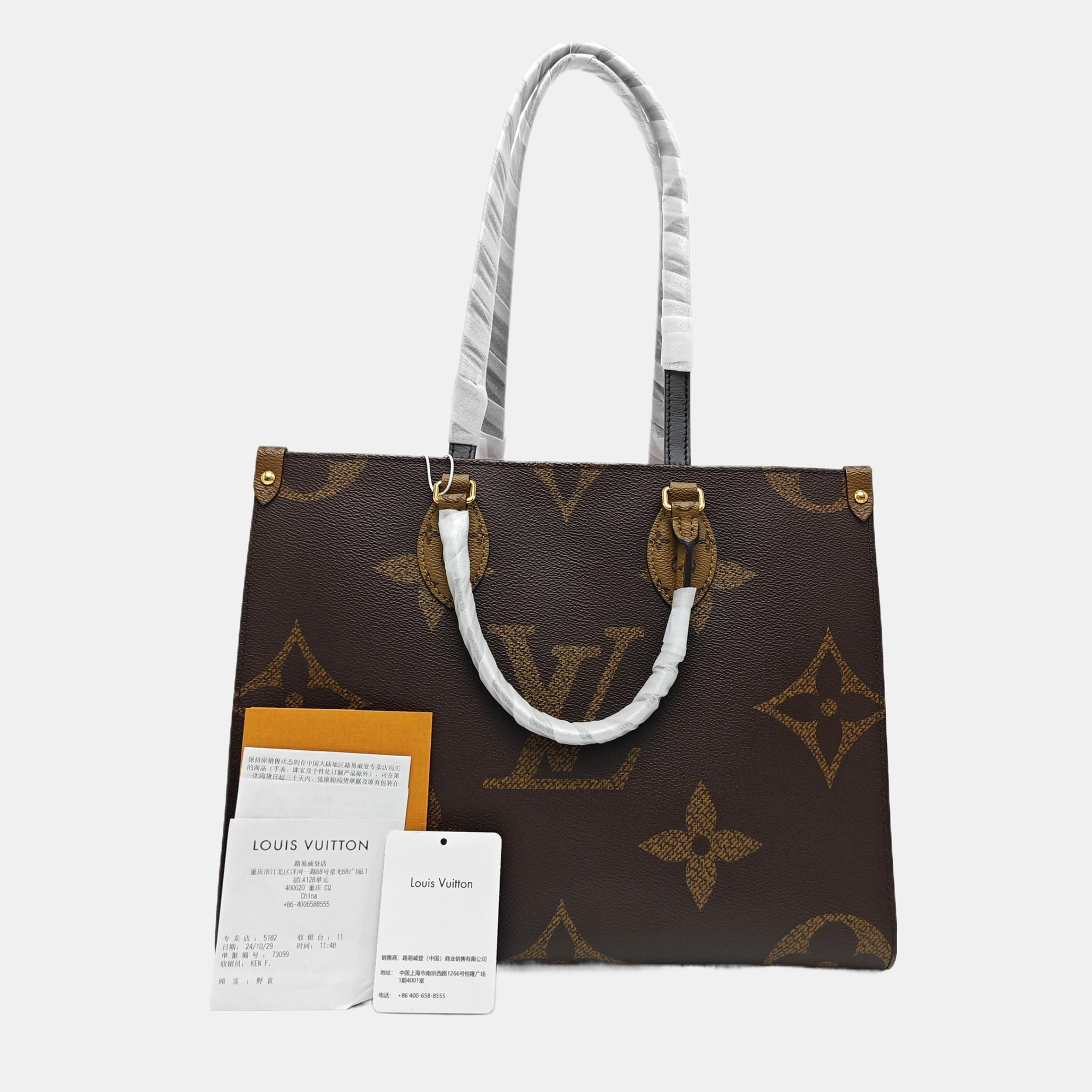 ONTHEGO MM Monogram Coated Canvas Brown