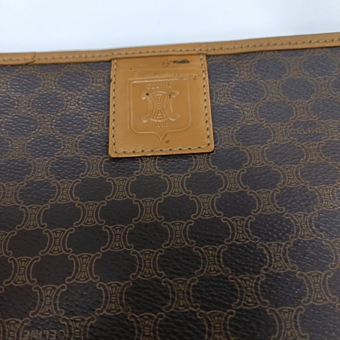 Authenticated pre-owned  MACADAM CLUTCHE Coated Canvas Brown - Clutch at Looply