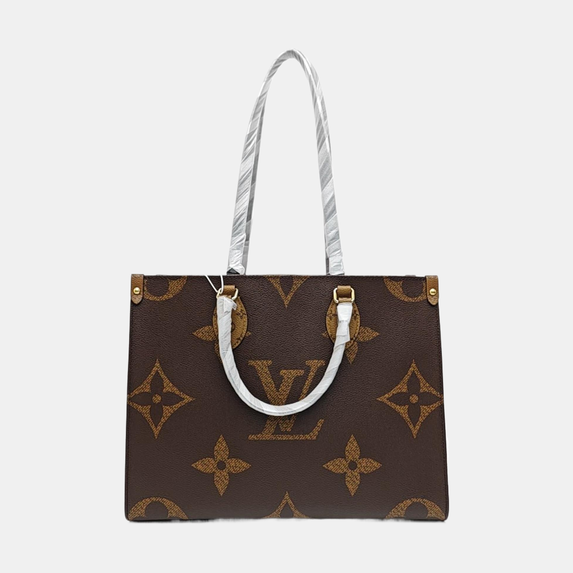 ONTHEGO MM Monogram Coated Canvas Brown
