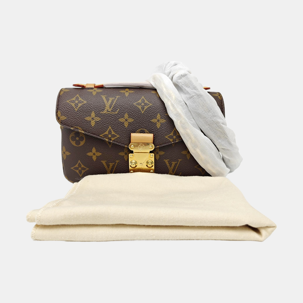 MÉTIS EAST WEST Monogram Coated Canvas Brown