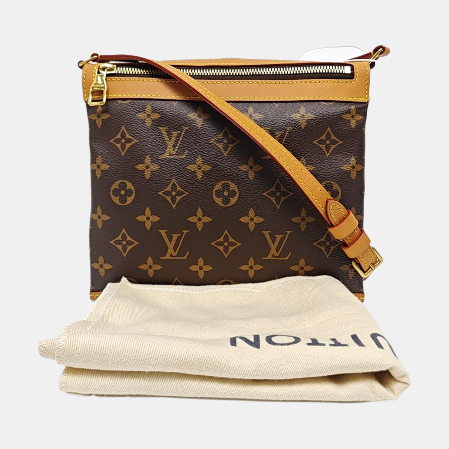 SAUMUR PM Monogram Coated Canvas Brown