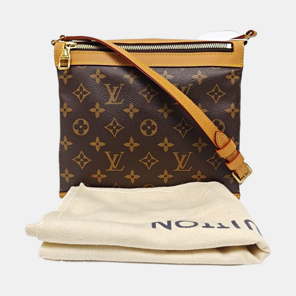 SAUMUR PM Monogram Coated Canvas Brown