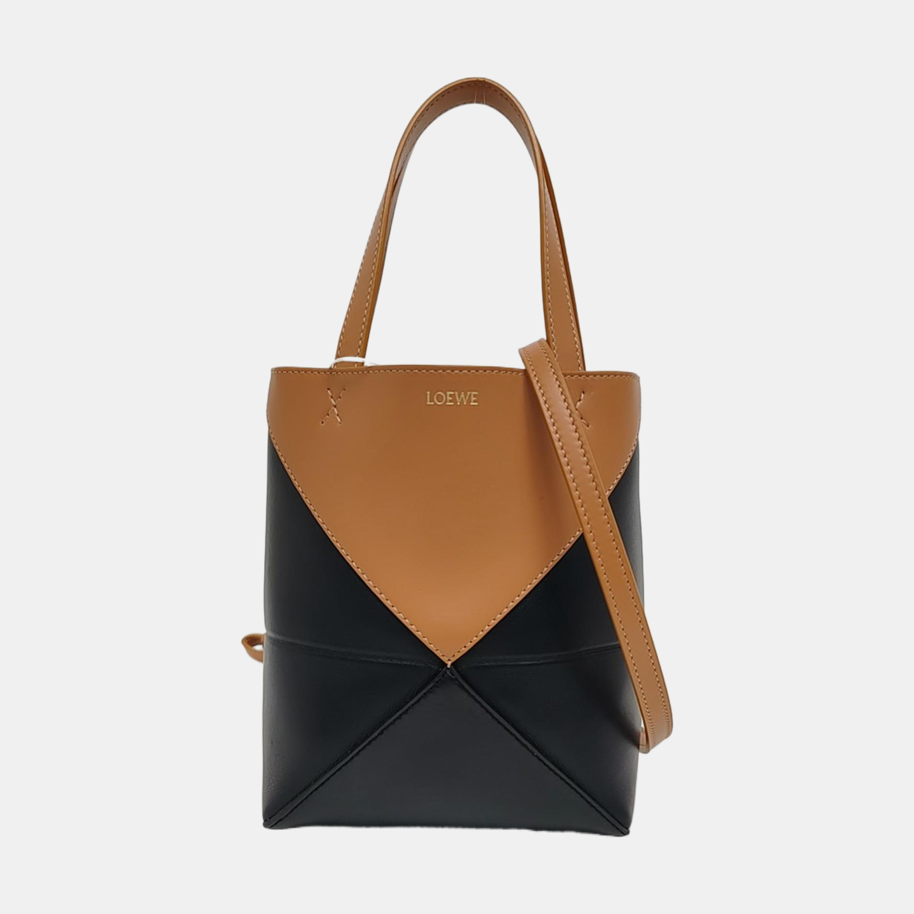 Authenticated pre-owned  Puzzle Fold Mini Calfskin Black - Tote Bag at Looply
