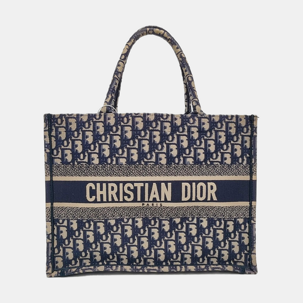 Authenticated pre-owned  Book Tote Medium Monogram Canvas Blue - Tote Bag at Looply