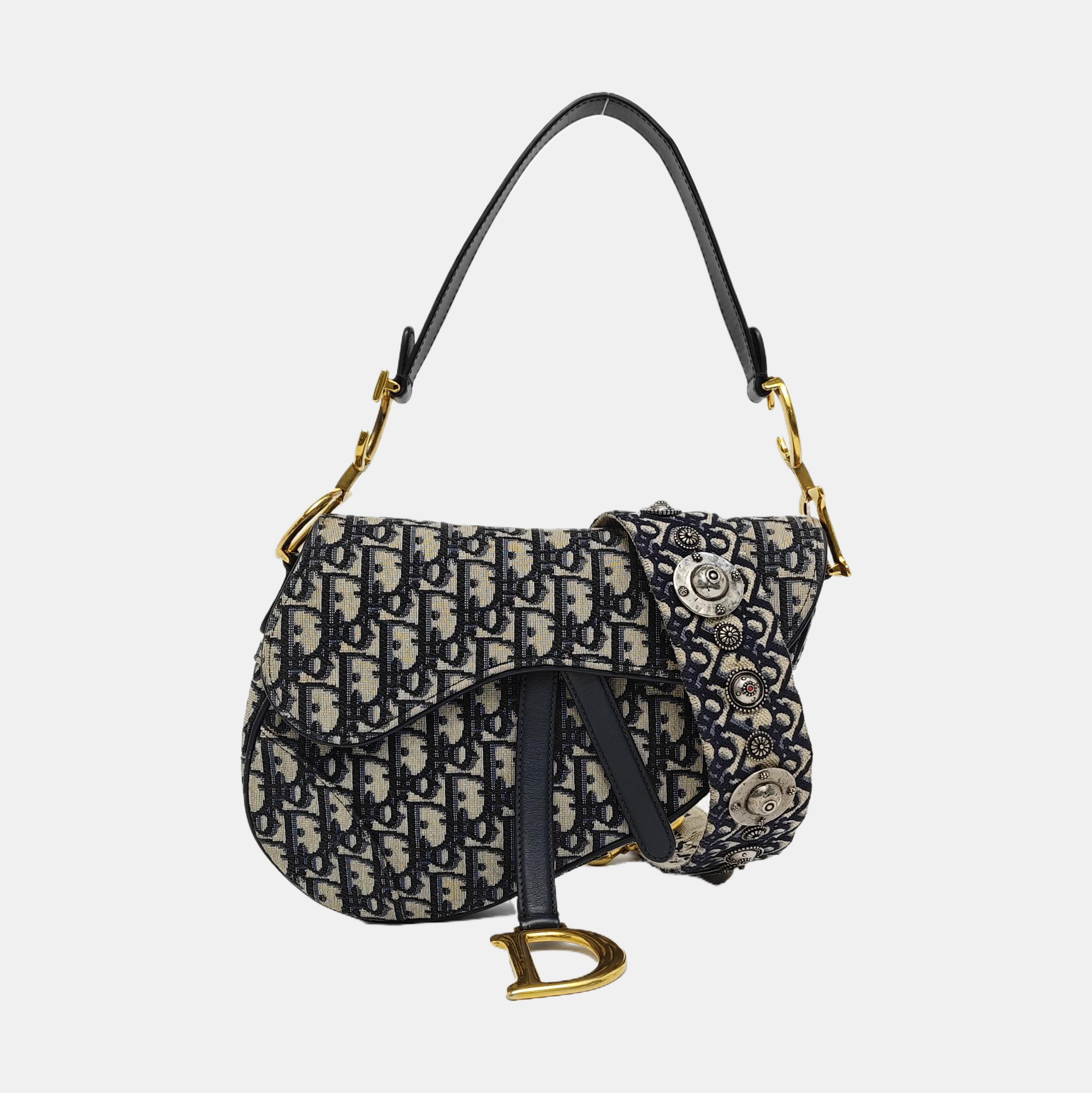 Authenticated pre-owned  Saddle Medium Monogram Canvas Blue - Shoulder Bag at Looply