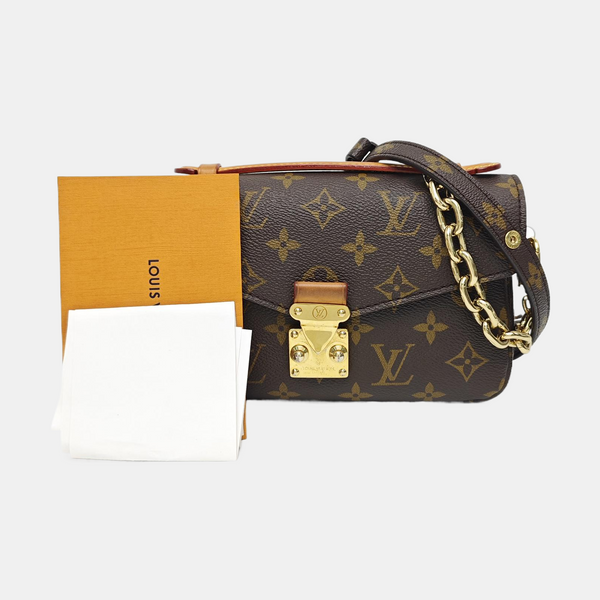 MÉTIS EAST WEST Monogram Coated Canvas Brown