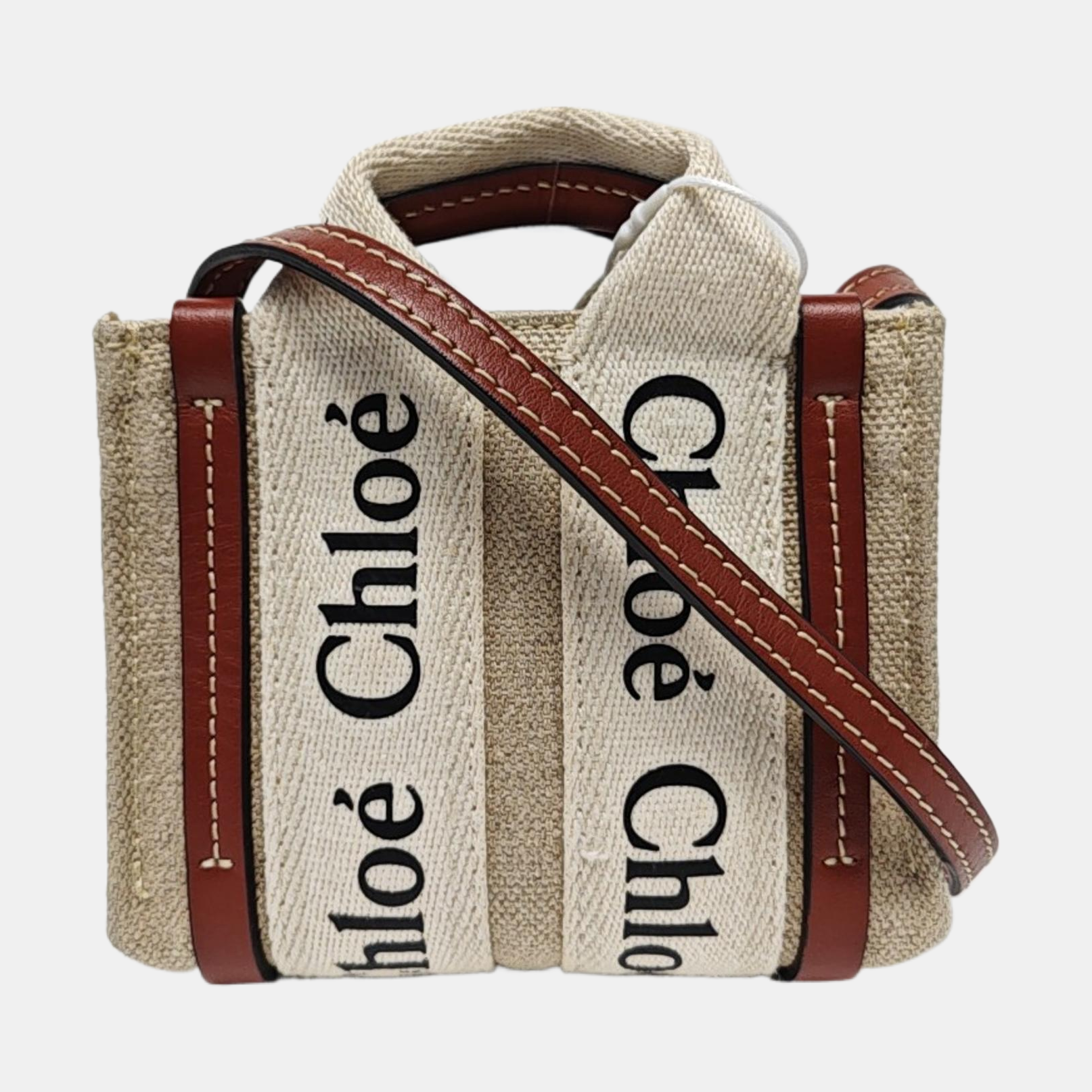 Authenticated pre-owned  Woody Nano Canvas Beige - Tote Bag at Looply