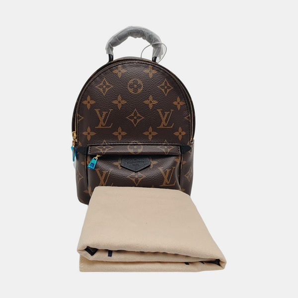 PALM SPRINGS Mini Monogram Coated Canvas Brown