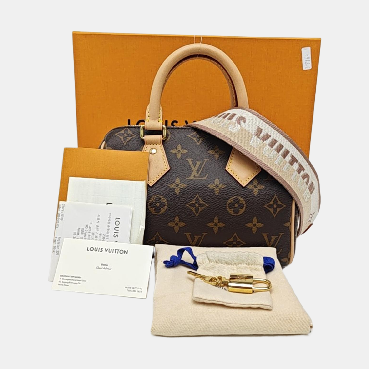 SPEEDY 20 Monogram Coated Canvas Brown