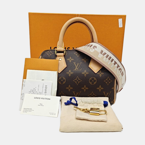 SPEEDY 20 Monogram Coated Canvas Brown
