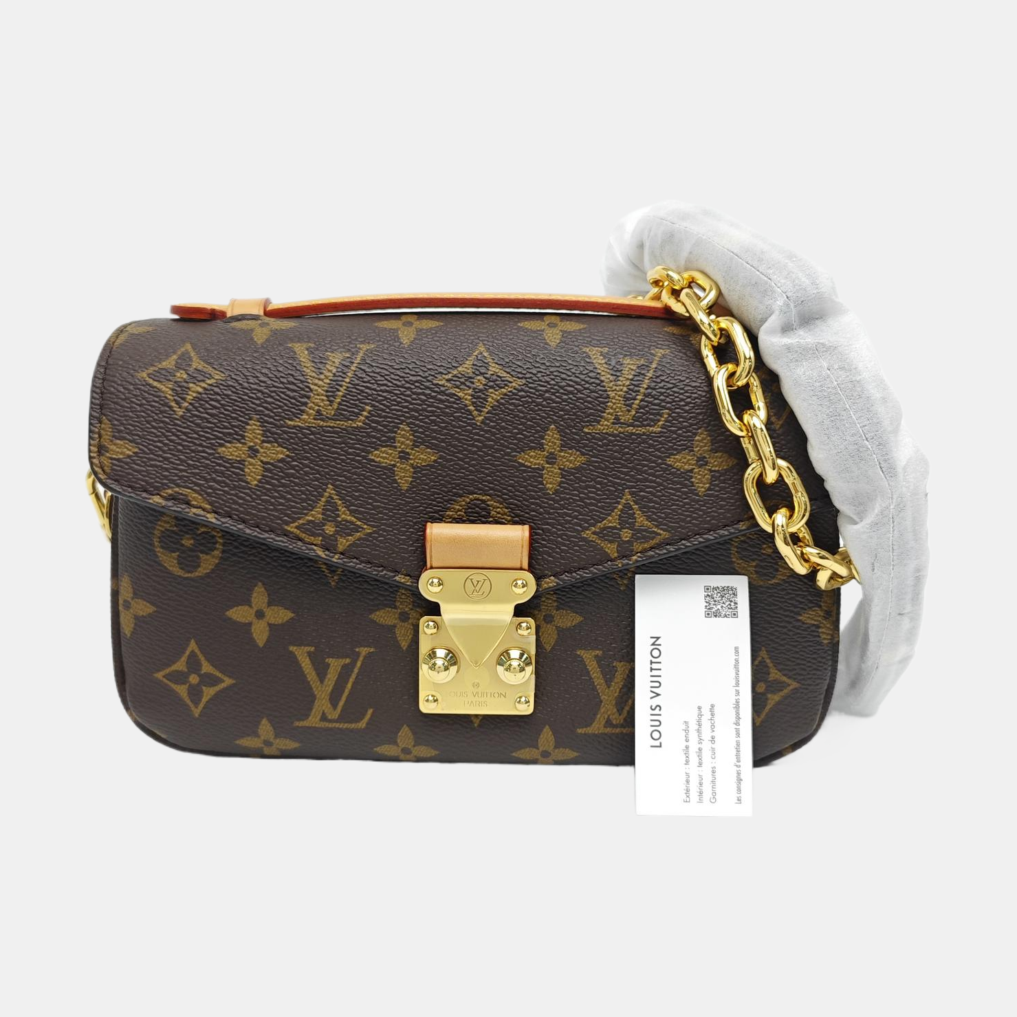 MÉTIS EAST WEST Monogram Coated Canvas Brown