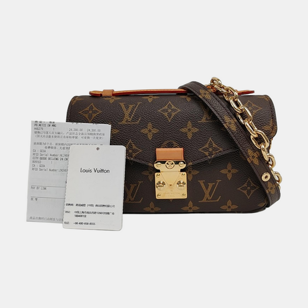 MÉTIS EAST WEST Monogram Coated Canvas Brown