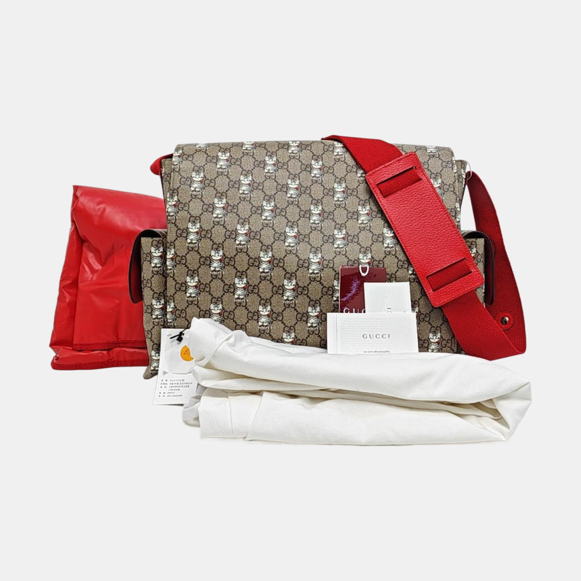 GG Supreme Medium Monogram Coated Canvas Brown