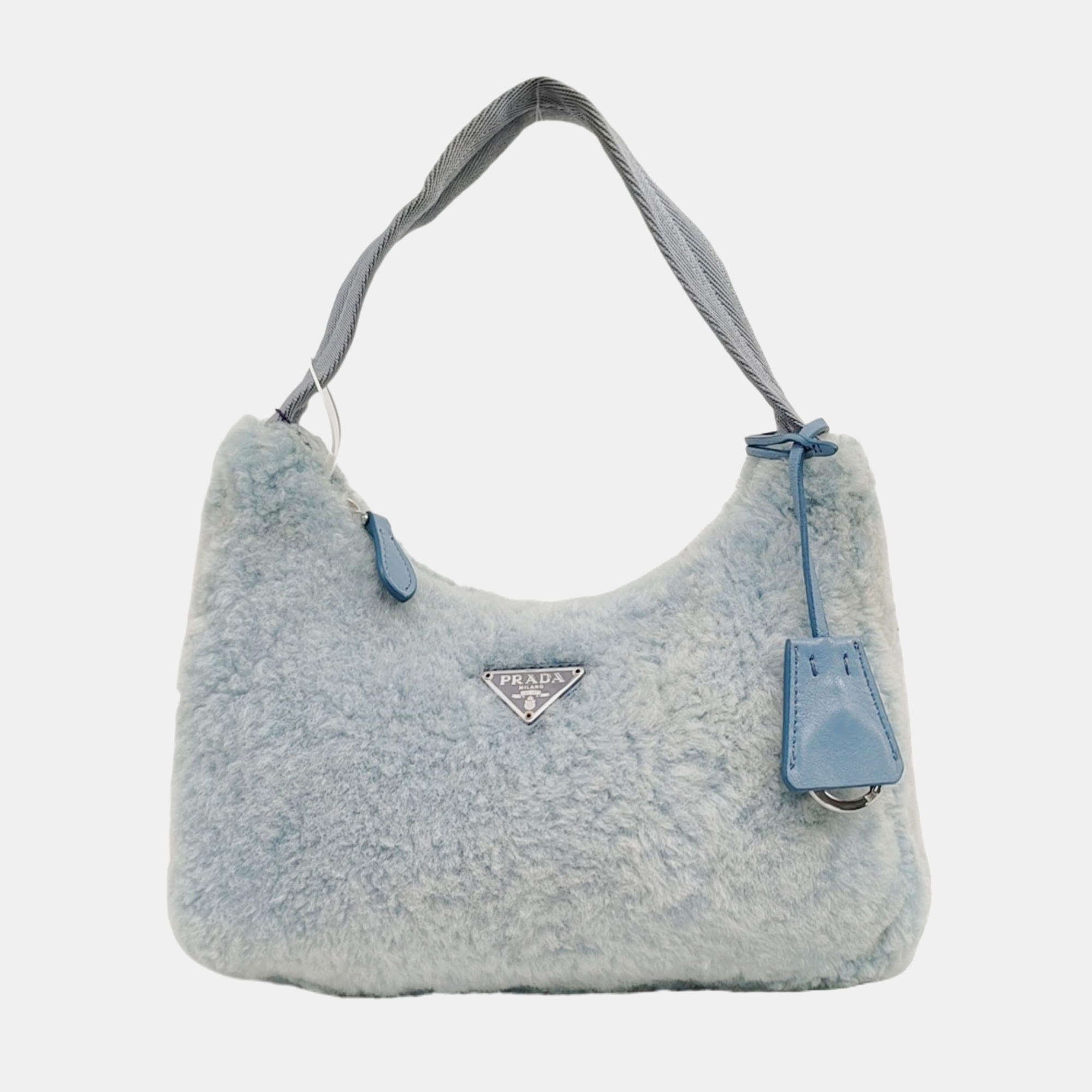 Authenticated pre-owned  Re-Edition2000 Mini Sheepskin Blue - Top Handle Bag at Looply