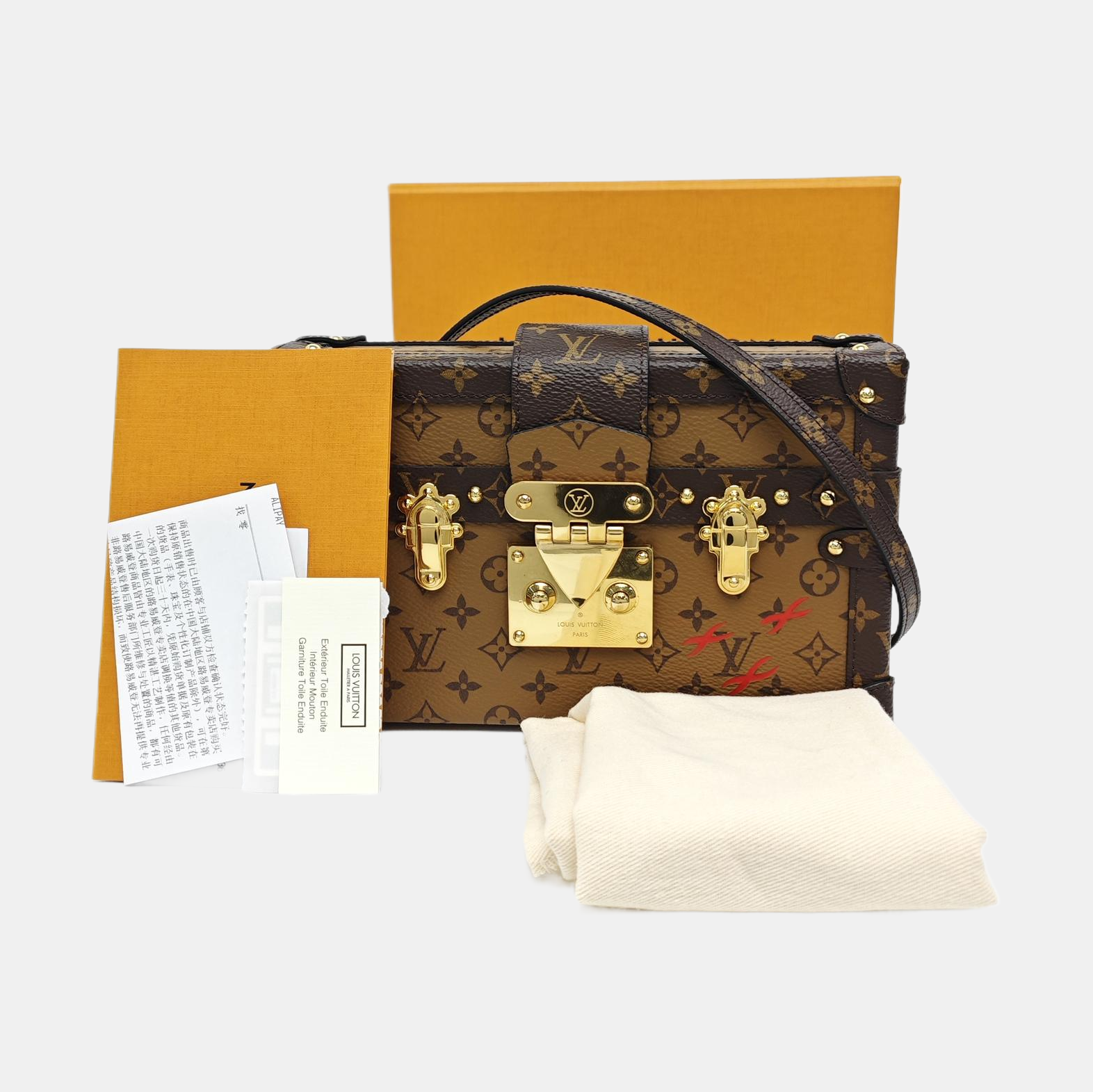 PETITE MALLE Monogram Coated Canvas Brown