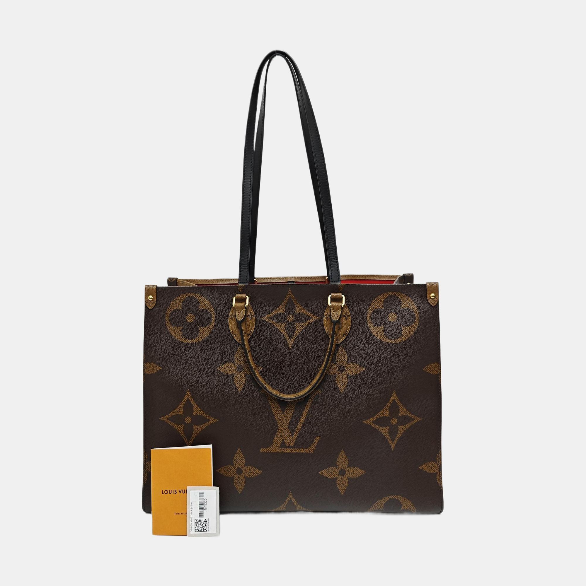 ONTHEGO GM Monogram Coated Canvas Brown
