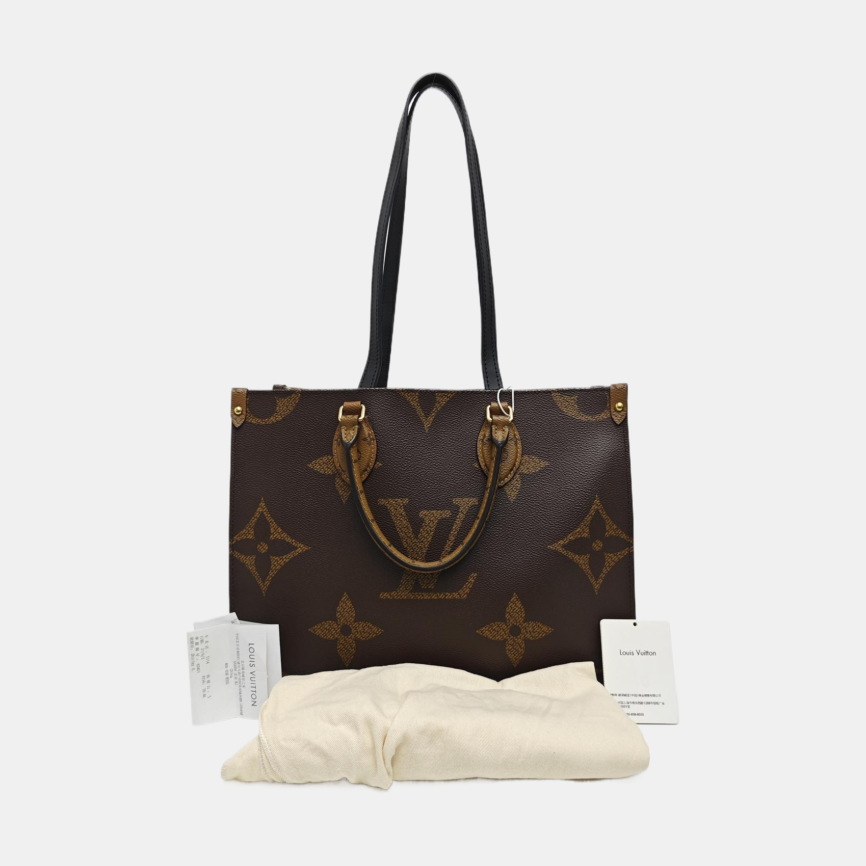 ONTHEGO MM Monogram Coated Canvas Brown