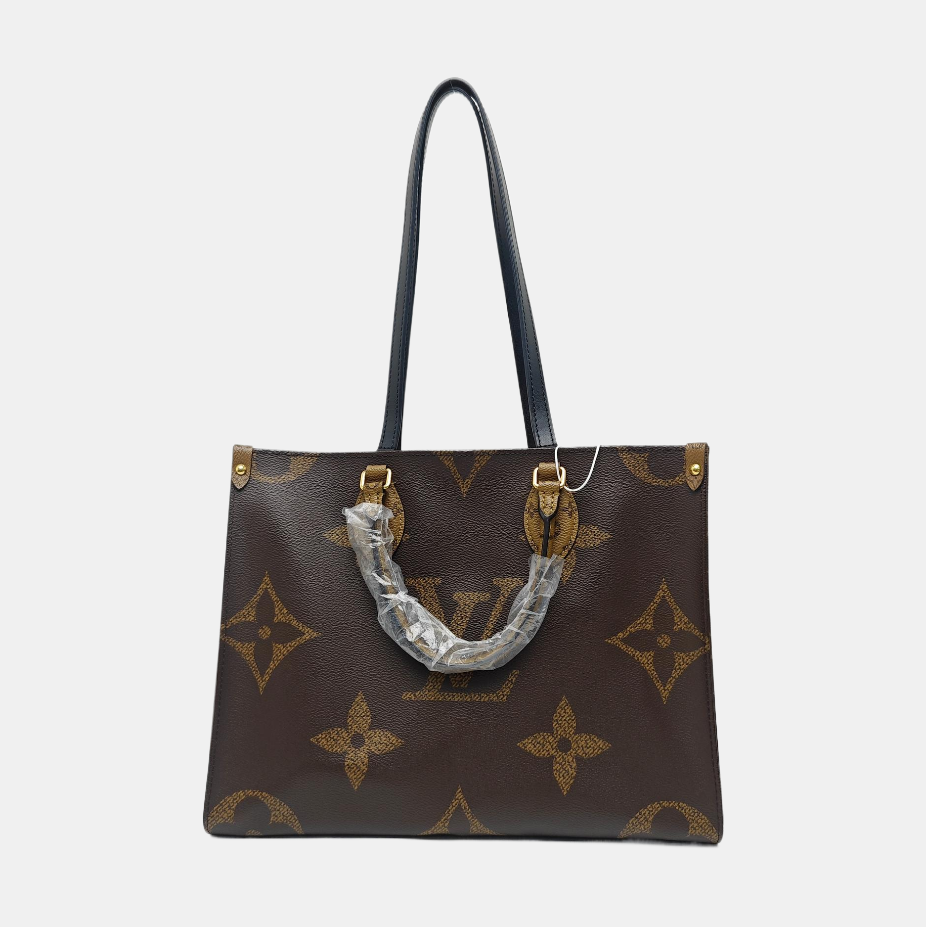 ONTHEGO MM Monogram Coated Canvas Brown