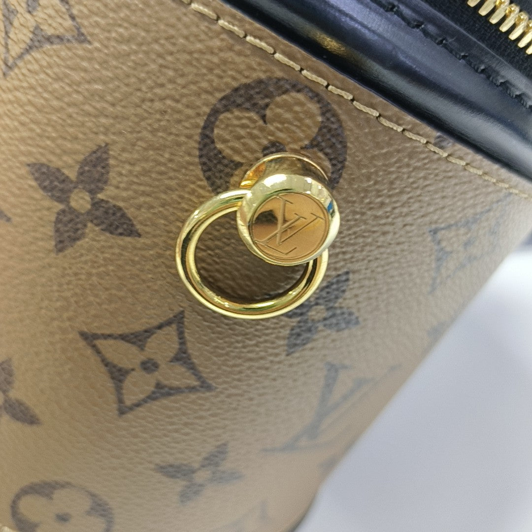 CANNES PM Monogram Coated Canvas Brown
