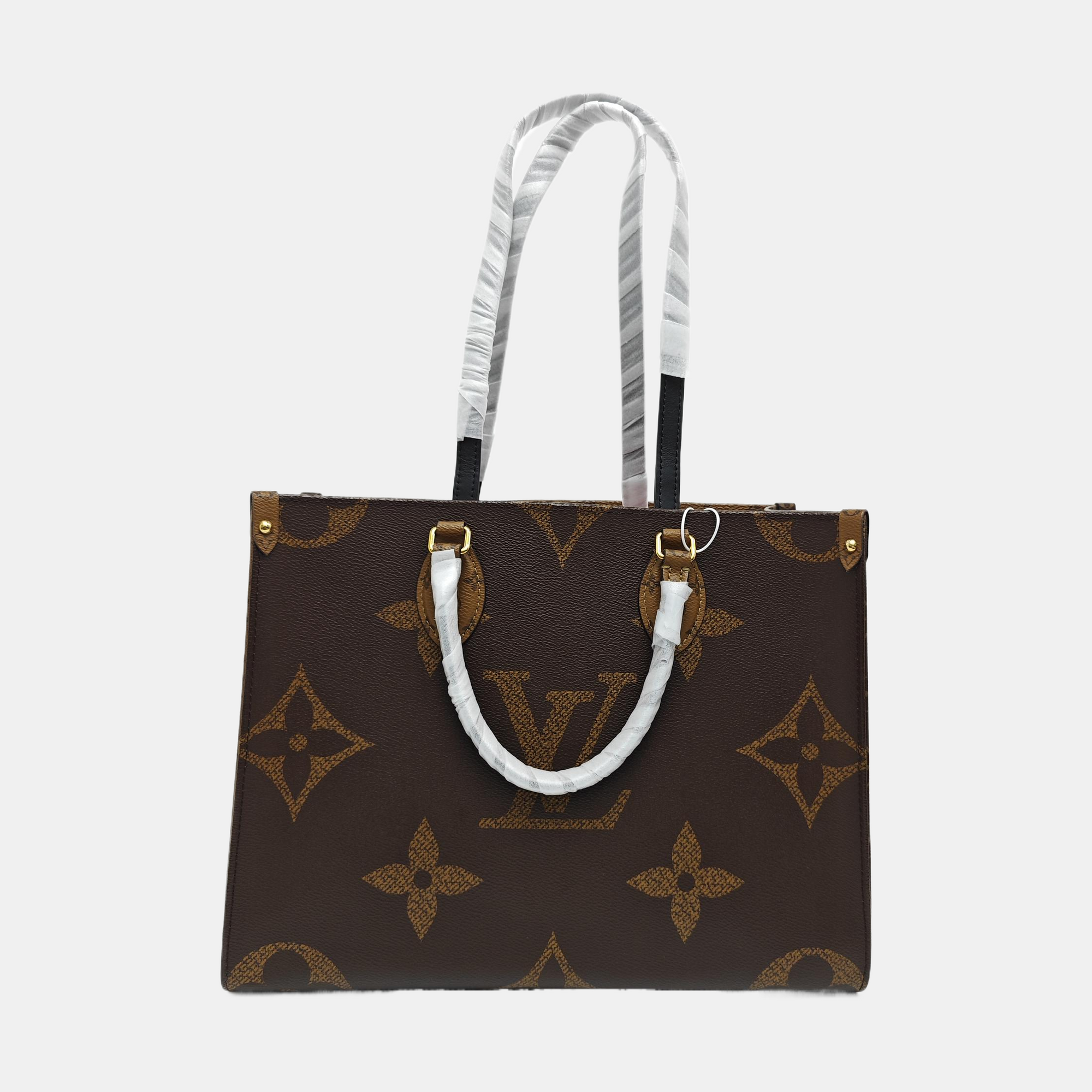 ONTHEGO MM Monogram Coated Canvas Brown