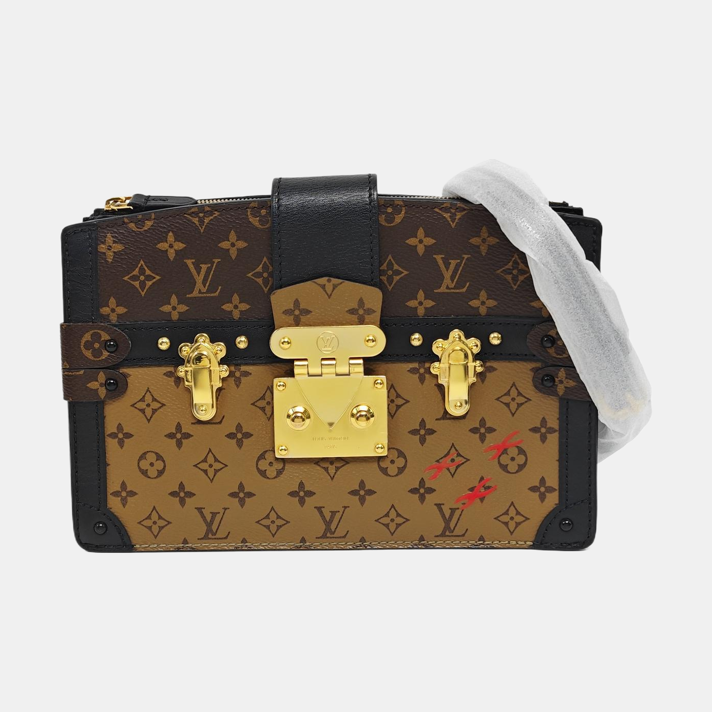 TRUNK Monogram Coated Canvas Brown