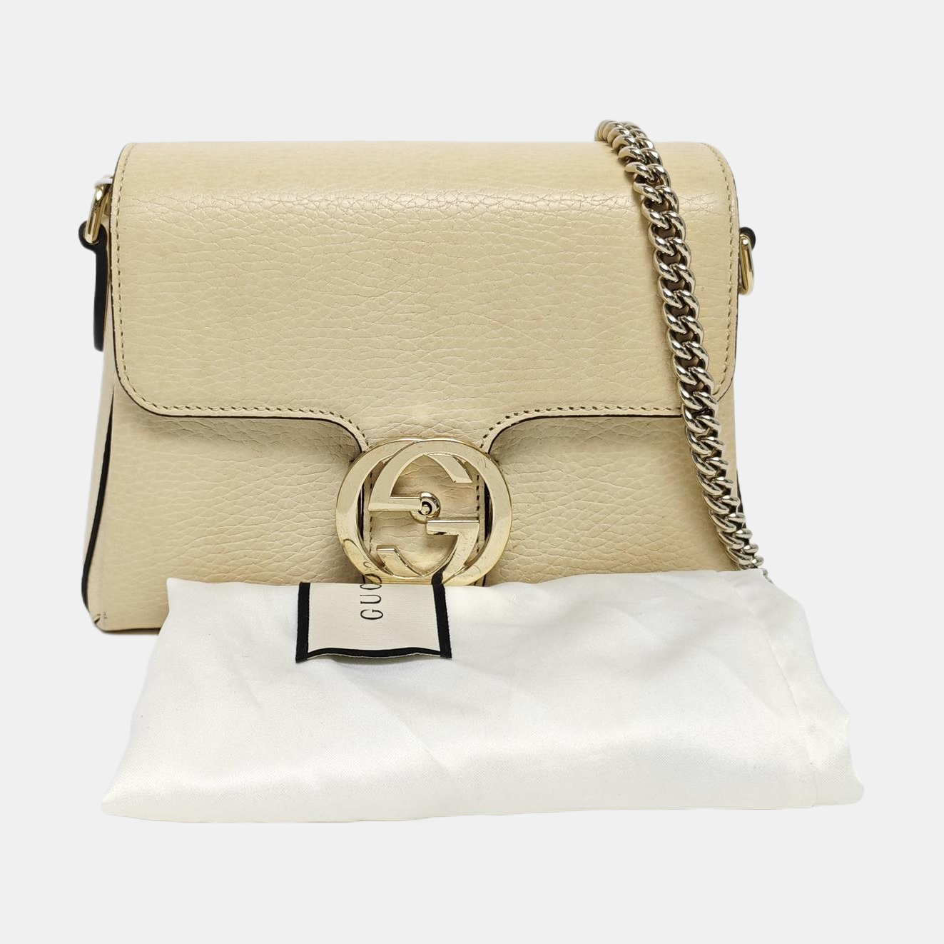 Piel de becerro mini con G entrelazada Beige