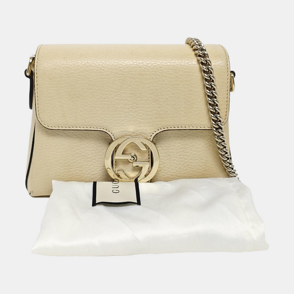 Piel de becerro mini con G entrelazada Beige