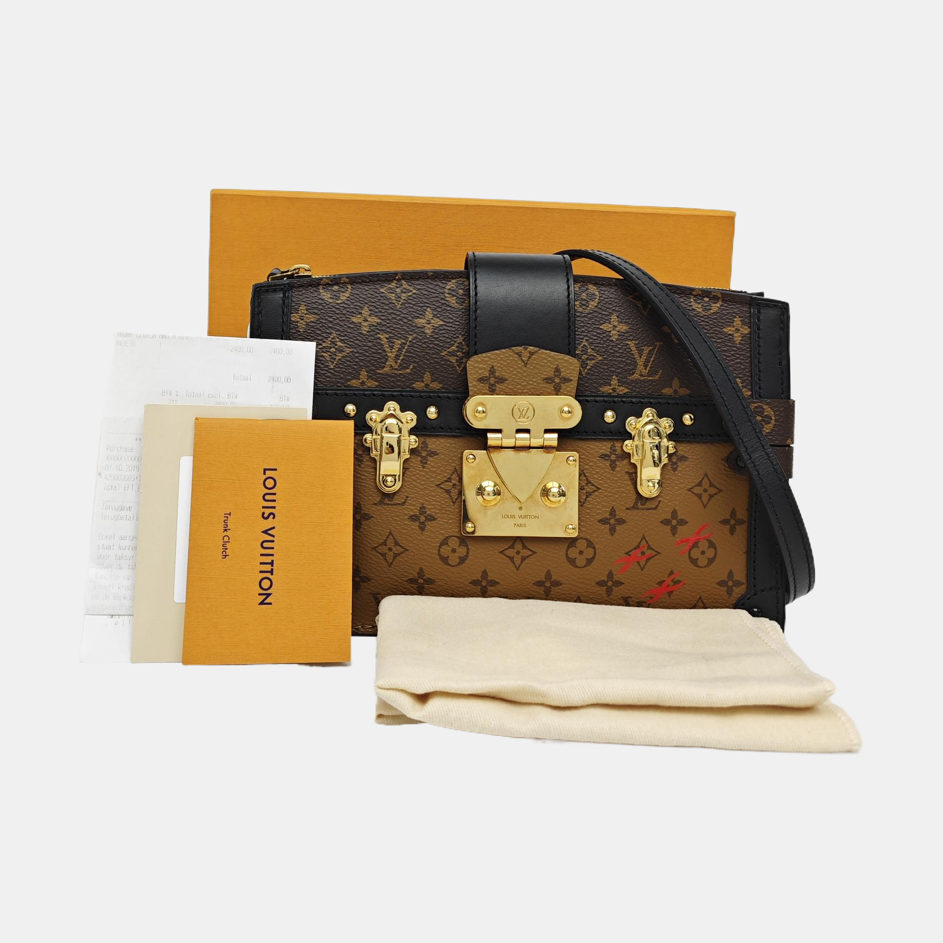 TRUNK Monogram Coated Canvas Brown