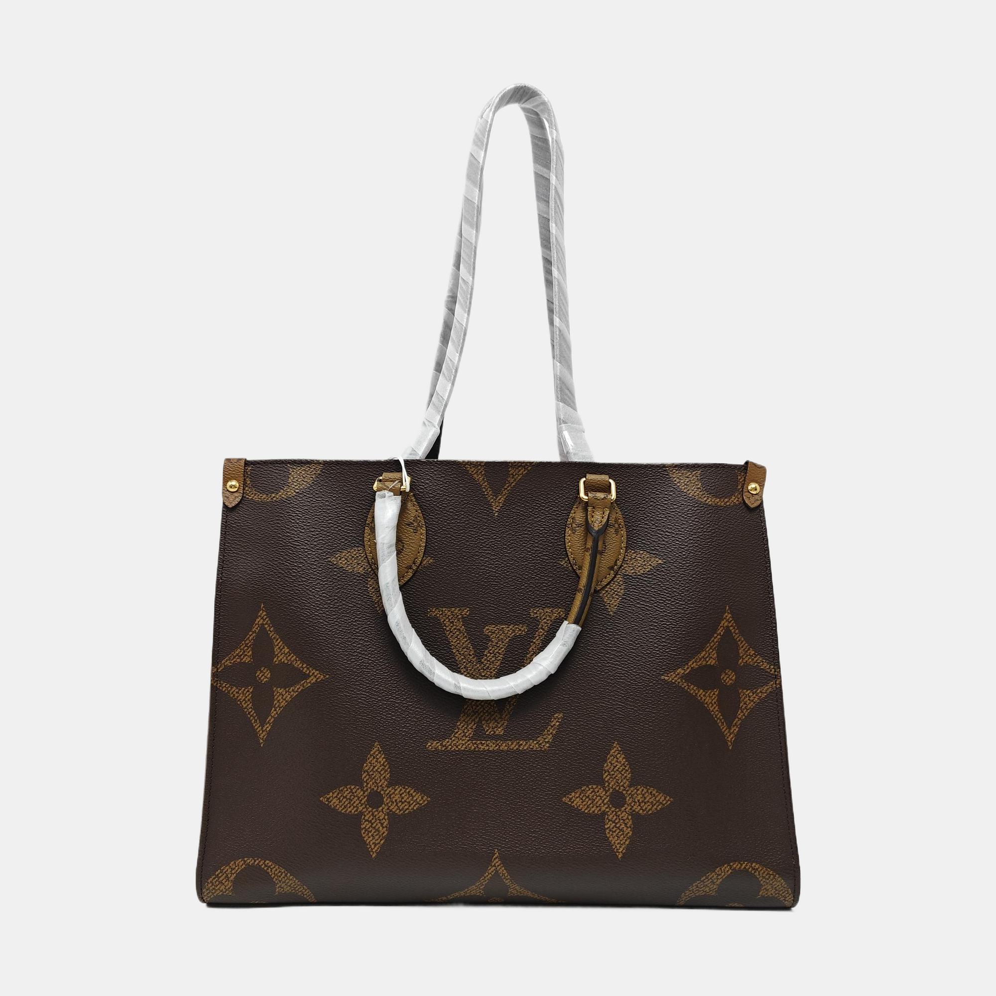 ONTHEGO MM Monogram Coated Canvas Brown