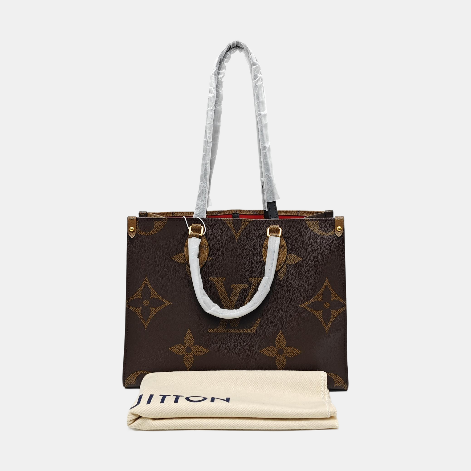 ONTHEGO MM Monogram Coated Canvas Brown