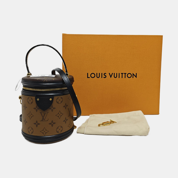 CANNES PM Monogram Coated Canvas Brown