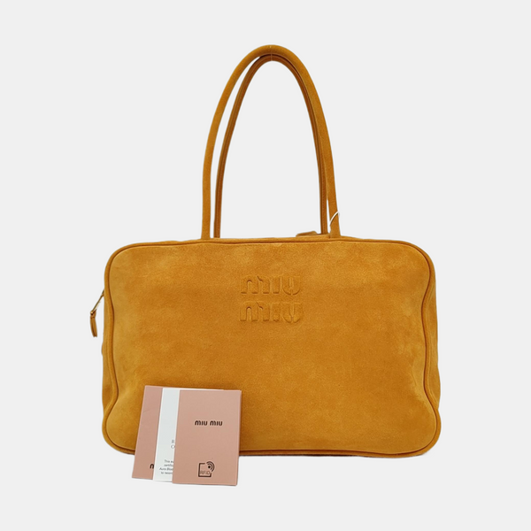 Authenticated pre-owned  Beau Suede Yellow - Top Handle Bag at Looply