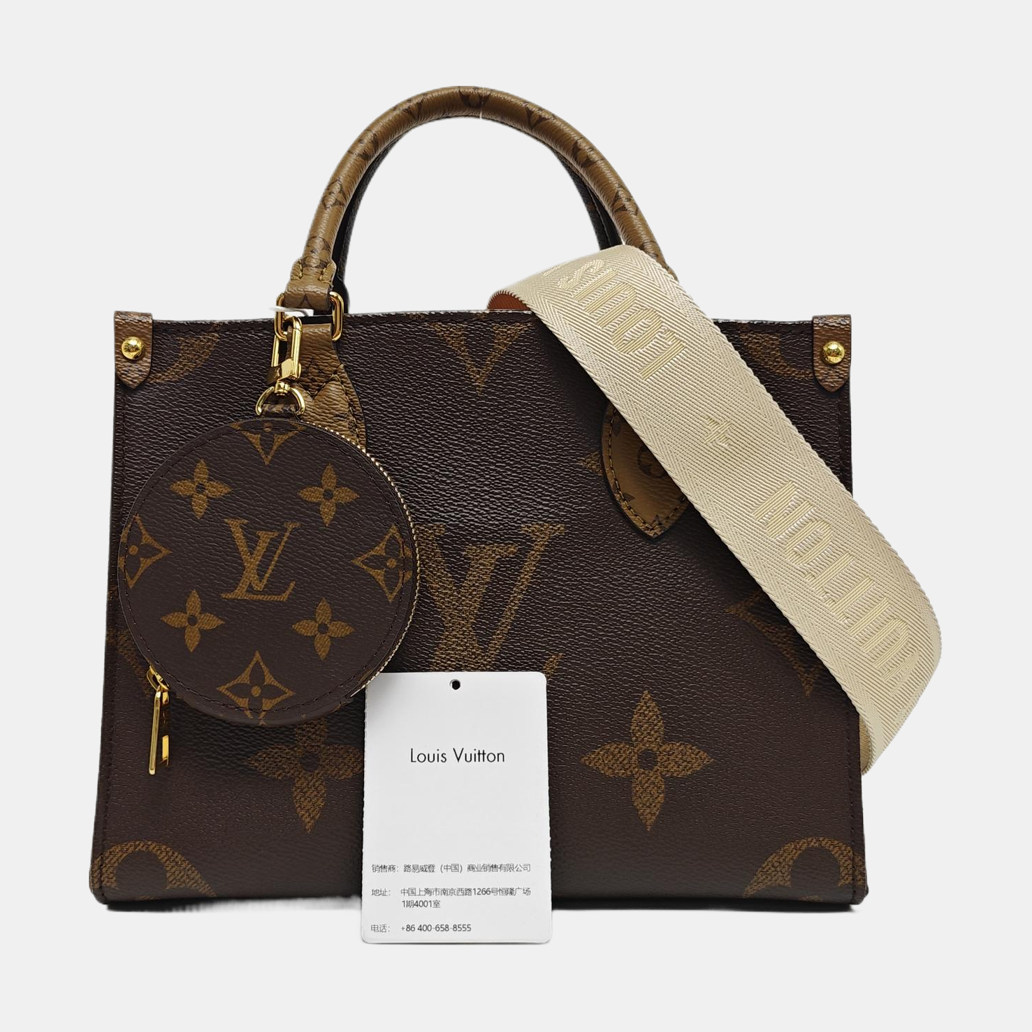 ONTHEGO PM Monogram Coated Canvas Brown
