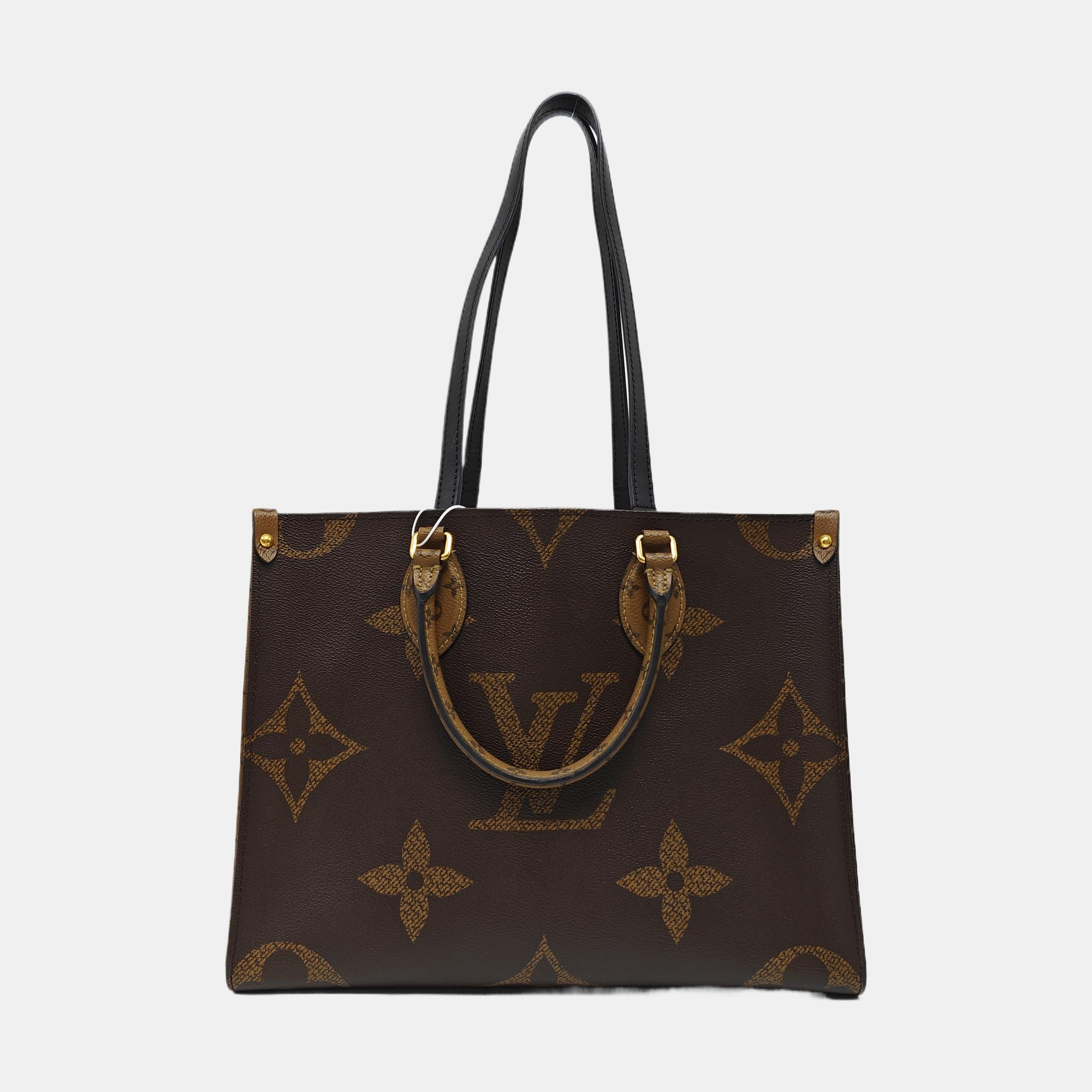 ONTHEGO MM Monogram Coated Canvas Brown