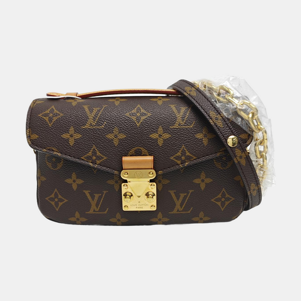 MÉTIS EAST WEST Monogram Coated Canvas Brown