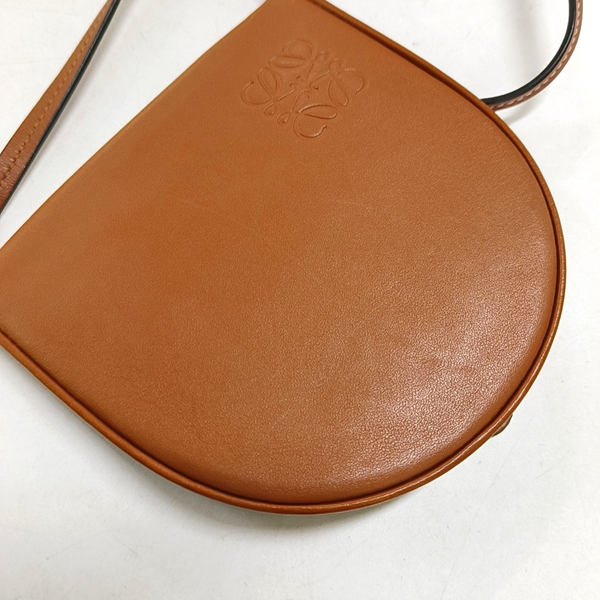 Authenticated pre-owned  Heel Small Calfskin Brown - Crossbody Bag at Looply